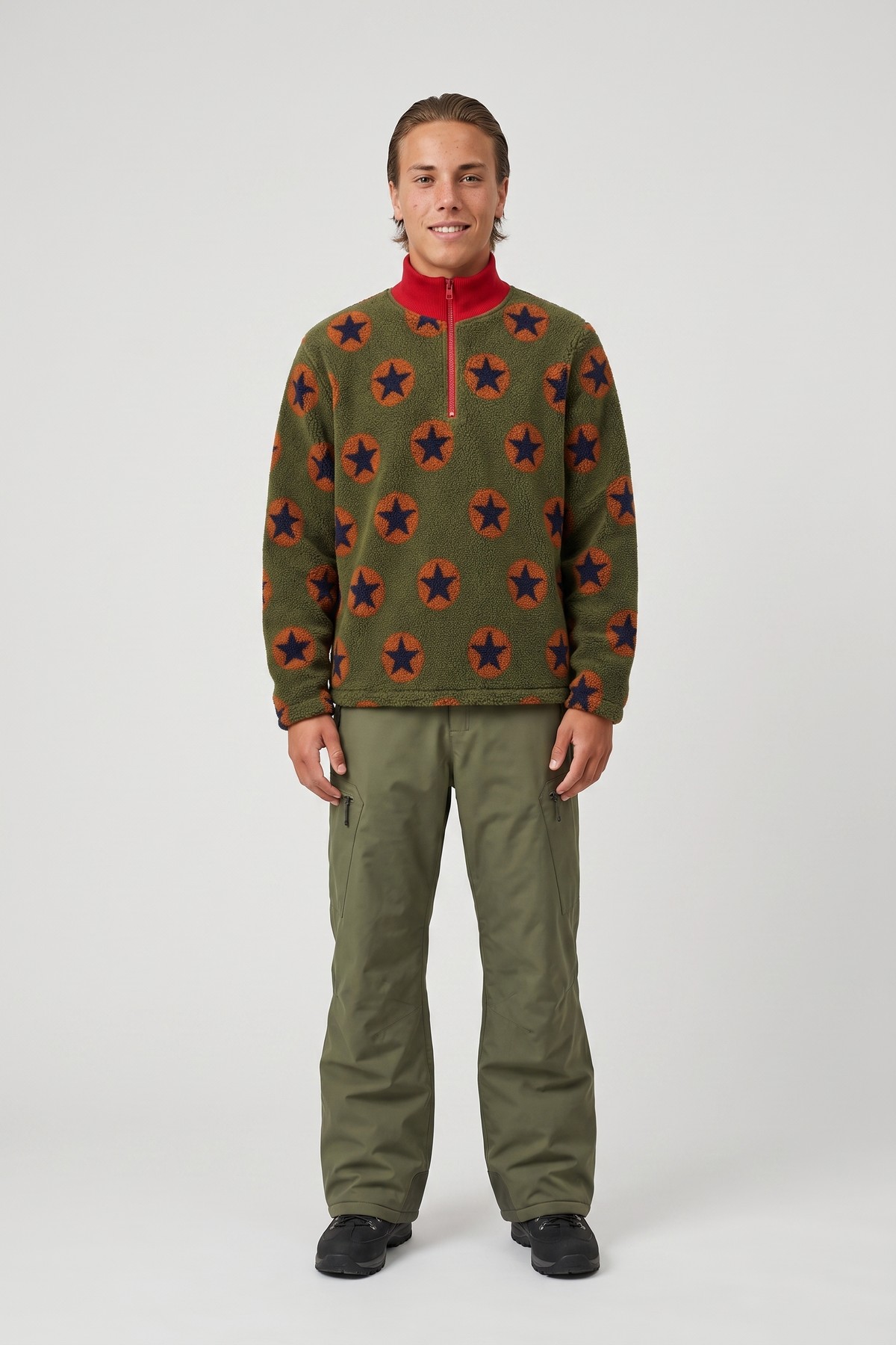 Model wearing the Wide Ski Pants, styled with a second collection piece