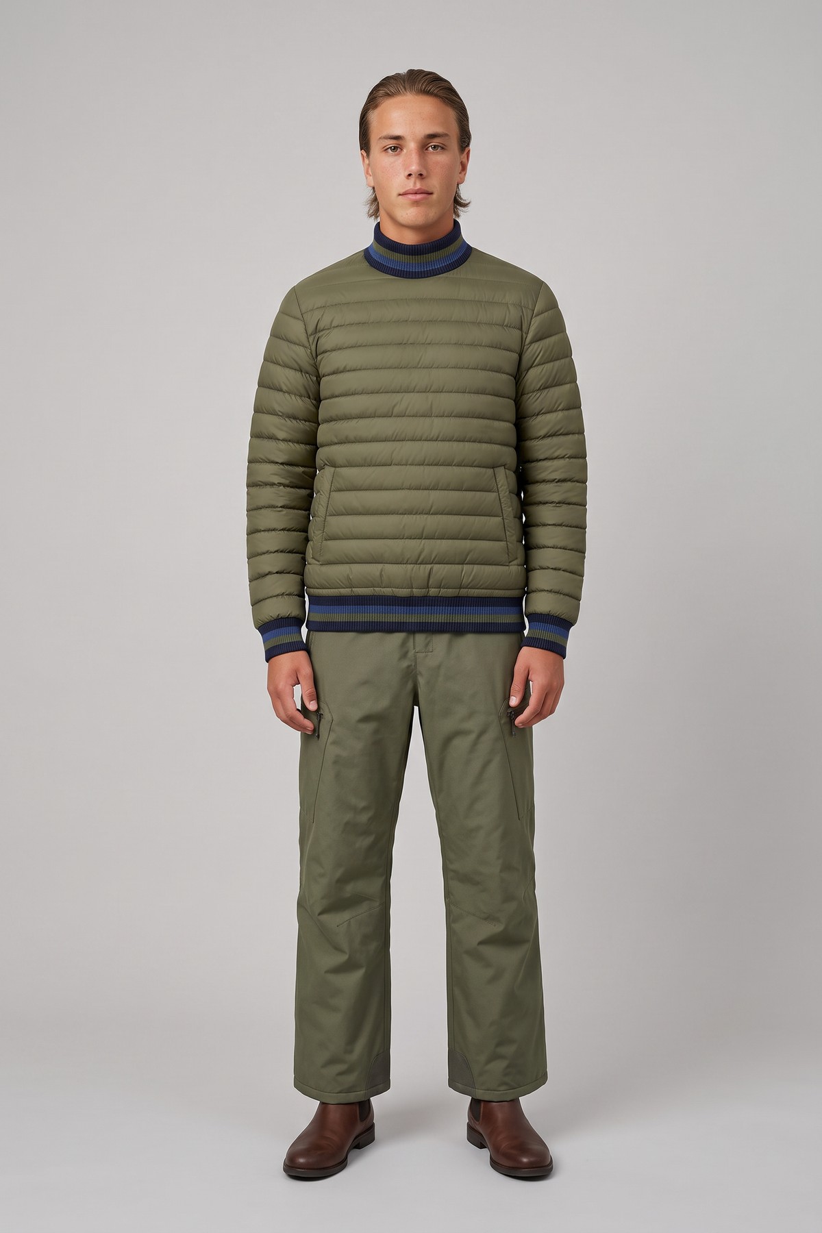 Model wearing the Quilted Down Pullover, styled with a second collection piece