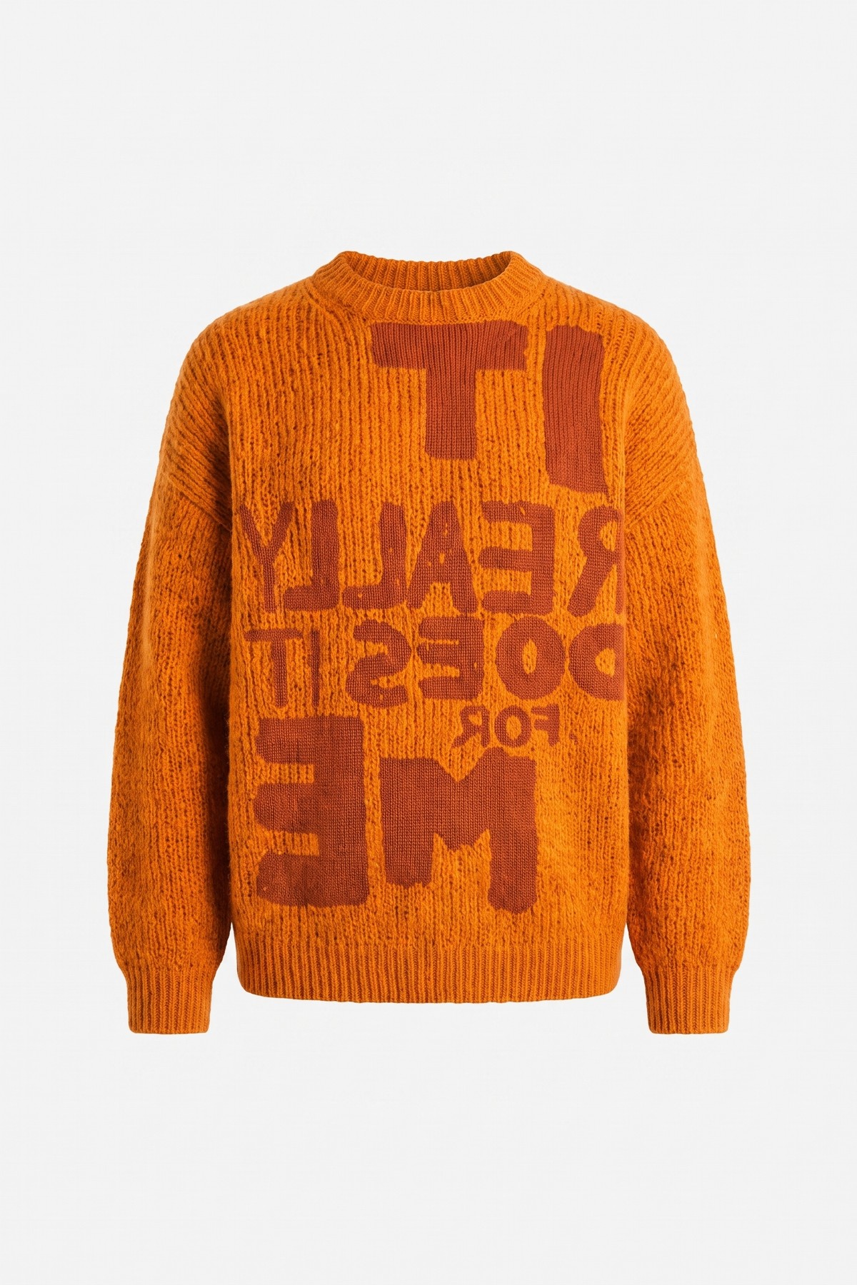 Orange chunky knit crew-neck sweater with tonal IT REALLY DOES IT FOR ME lettering across the front